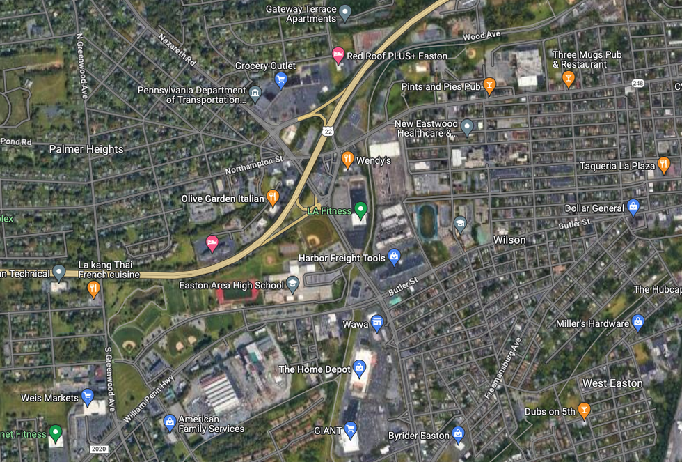 google maps satellite view of town with two running tracks in the middle