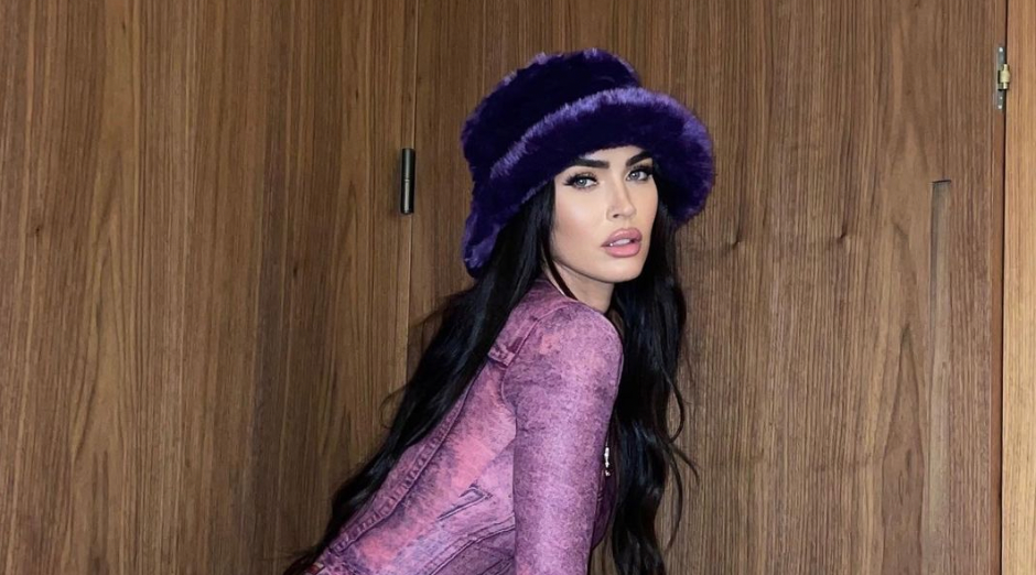 preview for Megan Fox channels Poison Ivy with white feathered hair extensions