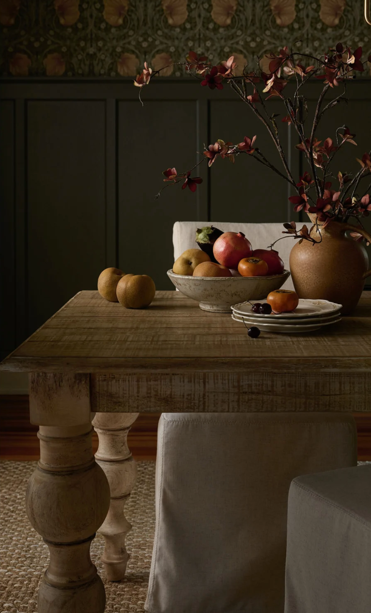 joanna gaines magnolia fall collection dining room with faux flowers in a vase on table
