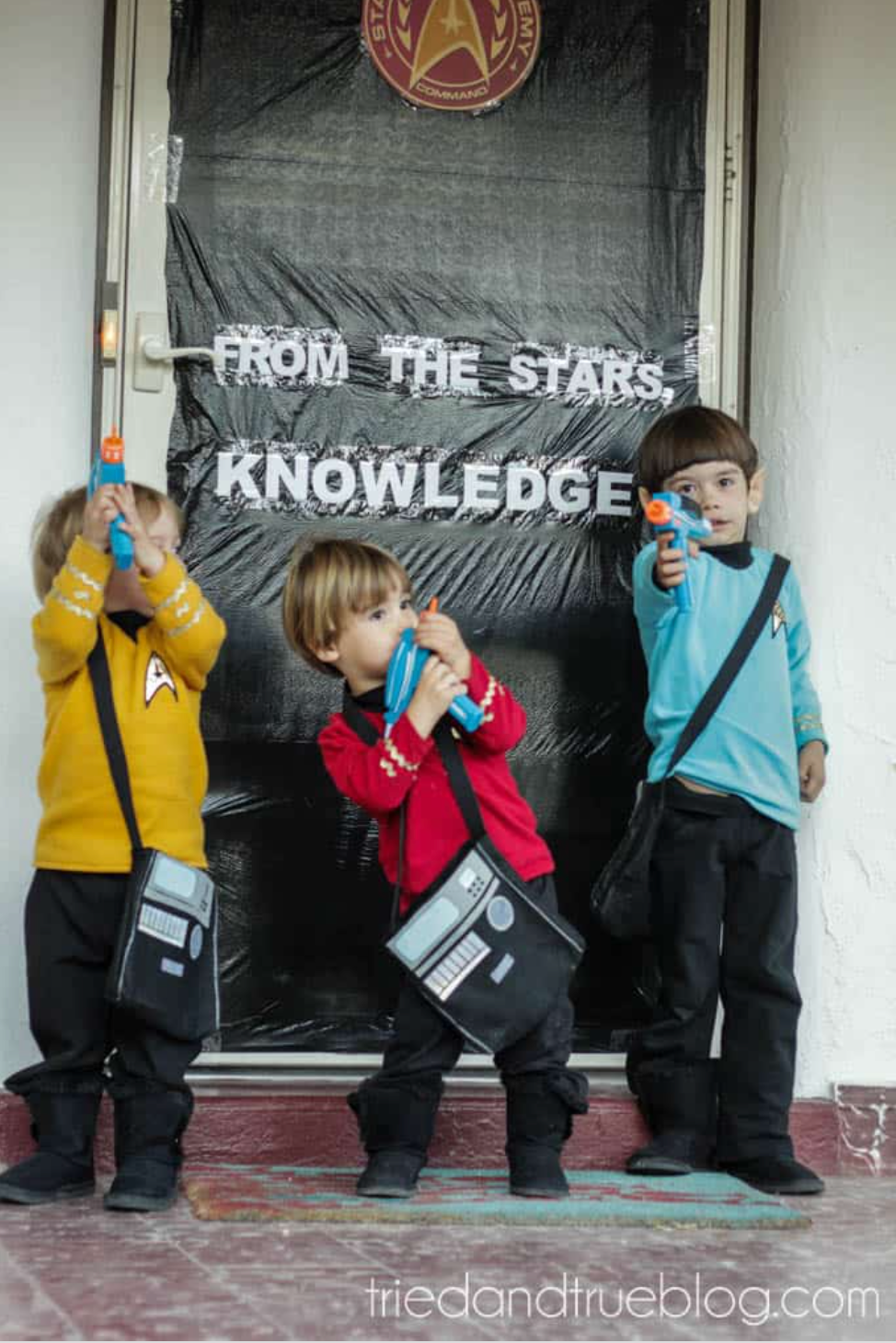 three little boys dressed in star trek costumes