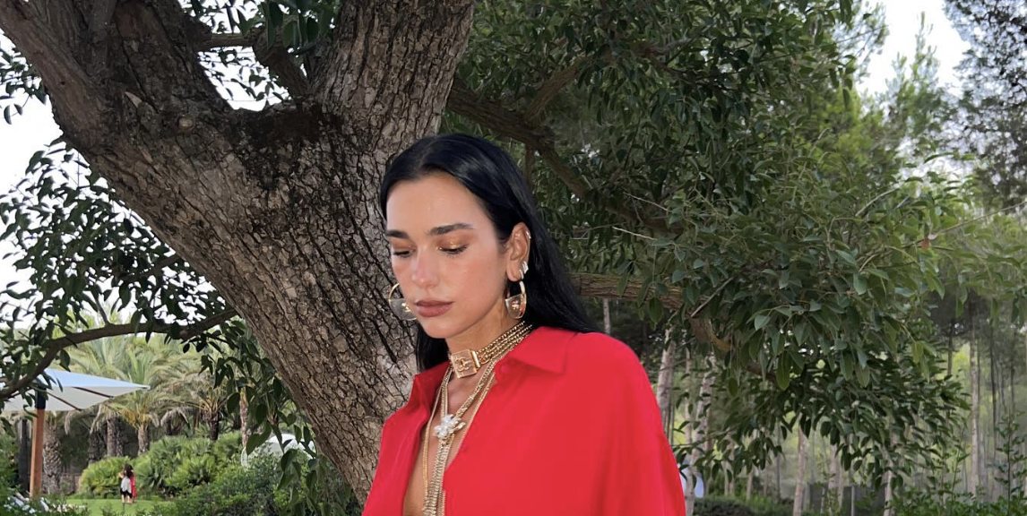 Dua Lipa Layers Her Red Birthday Gown With Gold Chanel Necklaces
