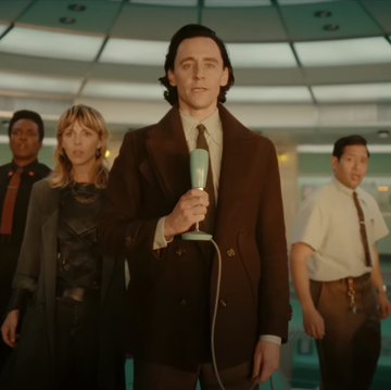 loki and the tva stand in a control room