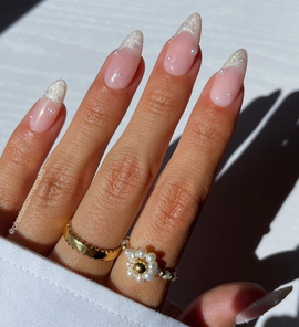 a hand with a ring on it