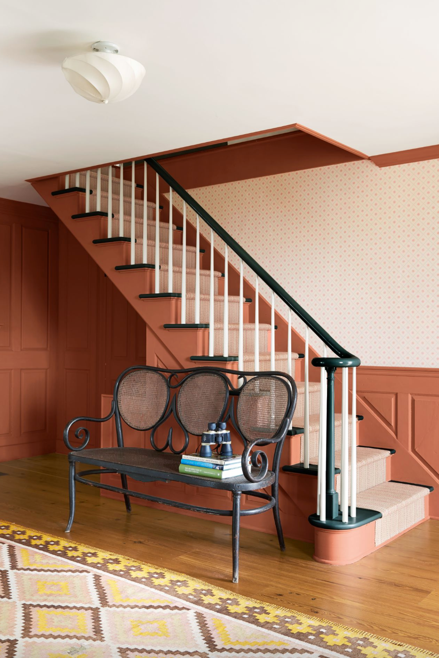 a chair and a table on a staircase