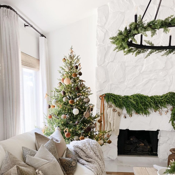 a living room with a christmas tree