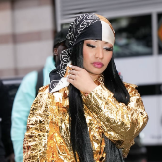 Nicki Minaj Proved She's the Queen of Outerwear by Wearing Three Eye-Popping Coats in One Day