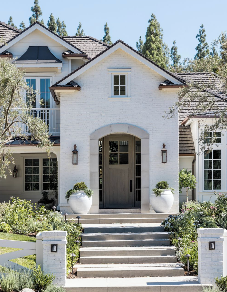 Green Front Door with Painted Striped Stairs - Blushing Bungalow