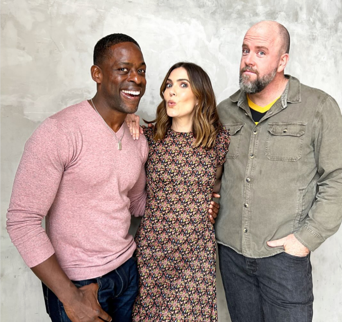 a group of people posing for the camera