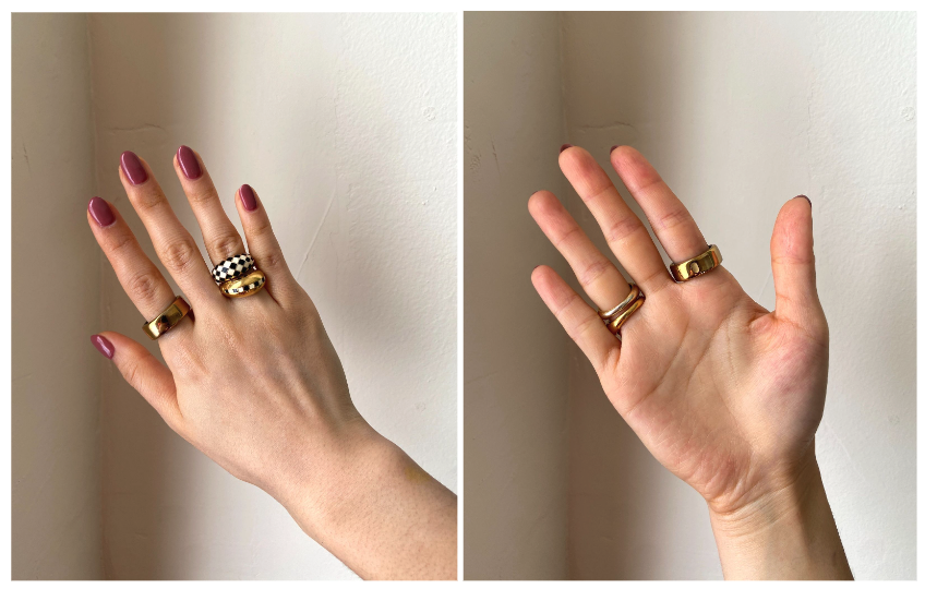a woman's hands with rings