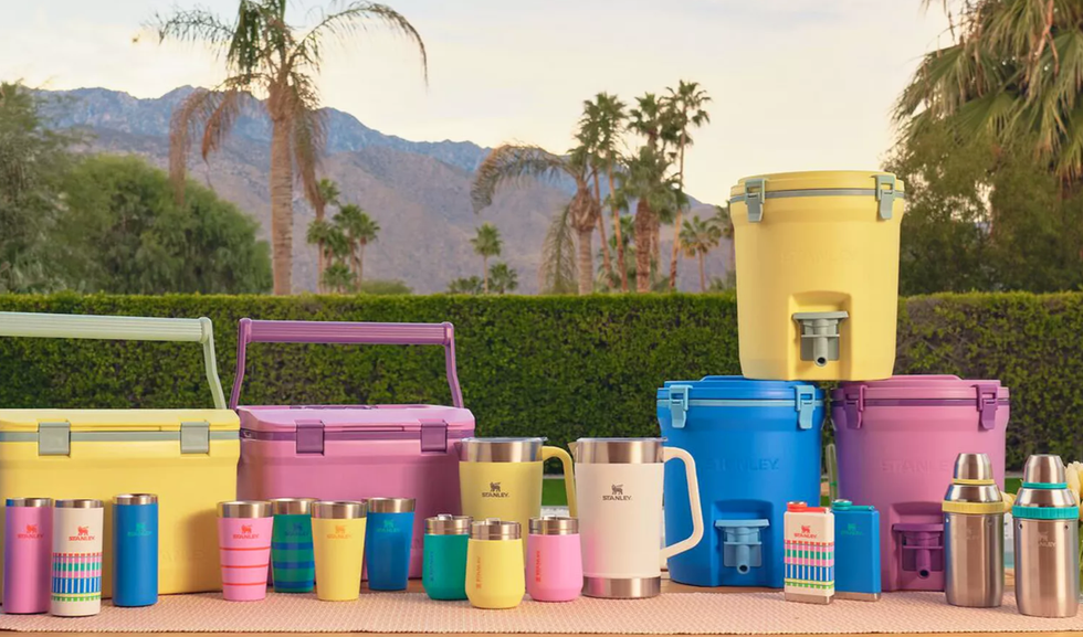 a group of containers with different colored liquid in them