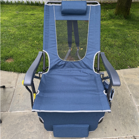 a blue chair on a sidewalk, gci outdoor freeform zero gravity lounger