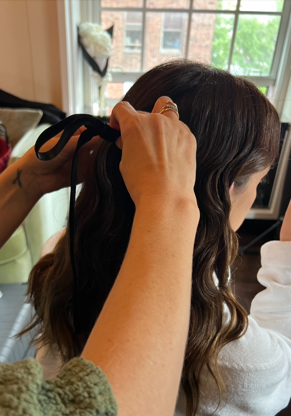 a woman with her hair in a bun