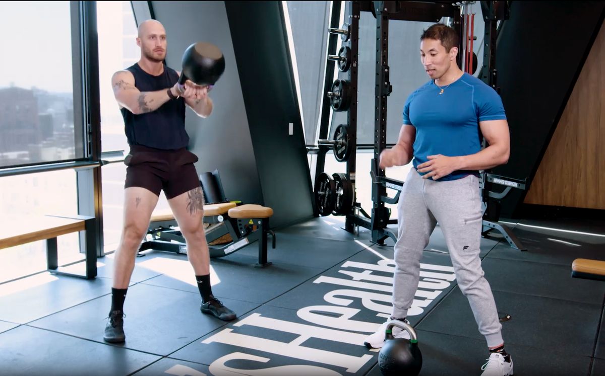 preview for Challenge Your Workout Partner to a 5-Minute Kettlebell Swing-Off | 5 Minutes of Hell | Men’s Health Muscle