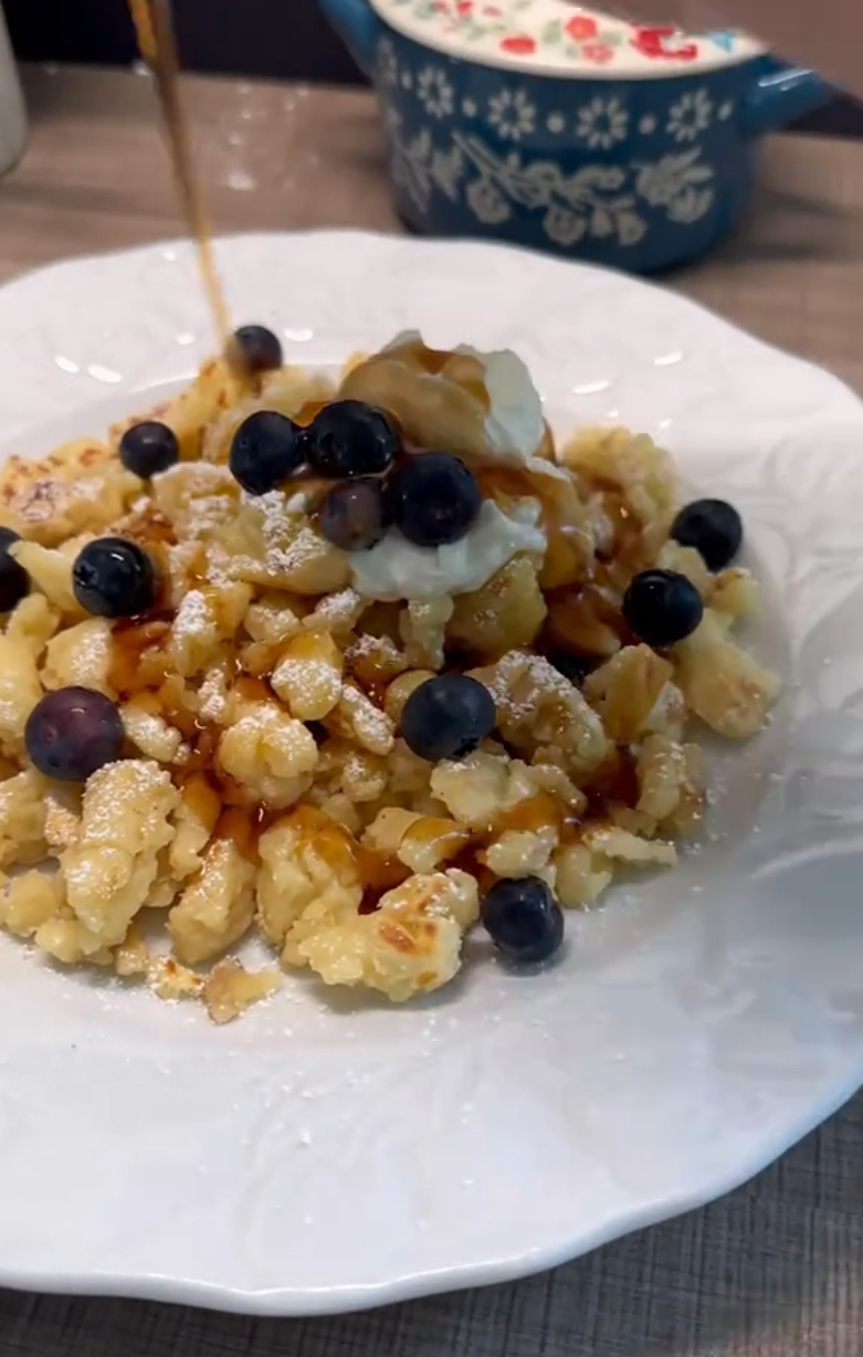 a bowl of cereal with blueberries