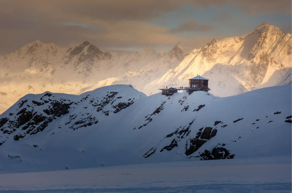 a building on a snowy mountain