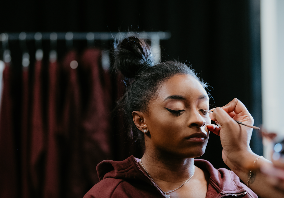 simone biles sitting for makeup