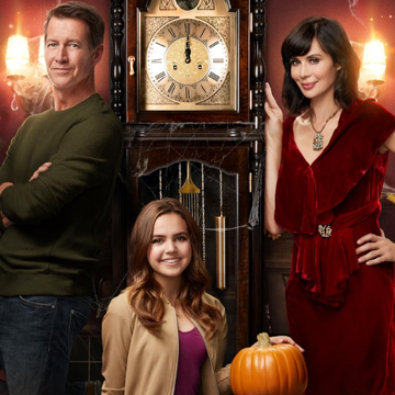Promotional poster for Good Witch Secrets of Grey House featuring characters and autumn elements promotional poster for good witch secrets of grey house featuring characters and autumn elements