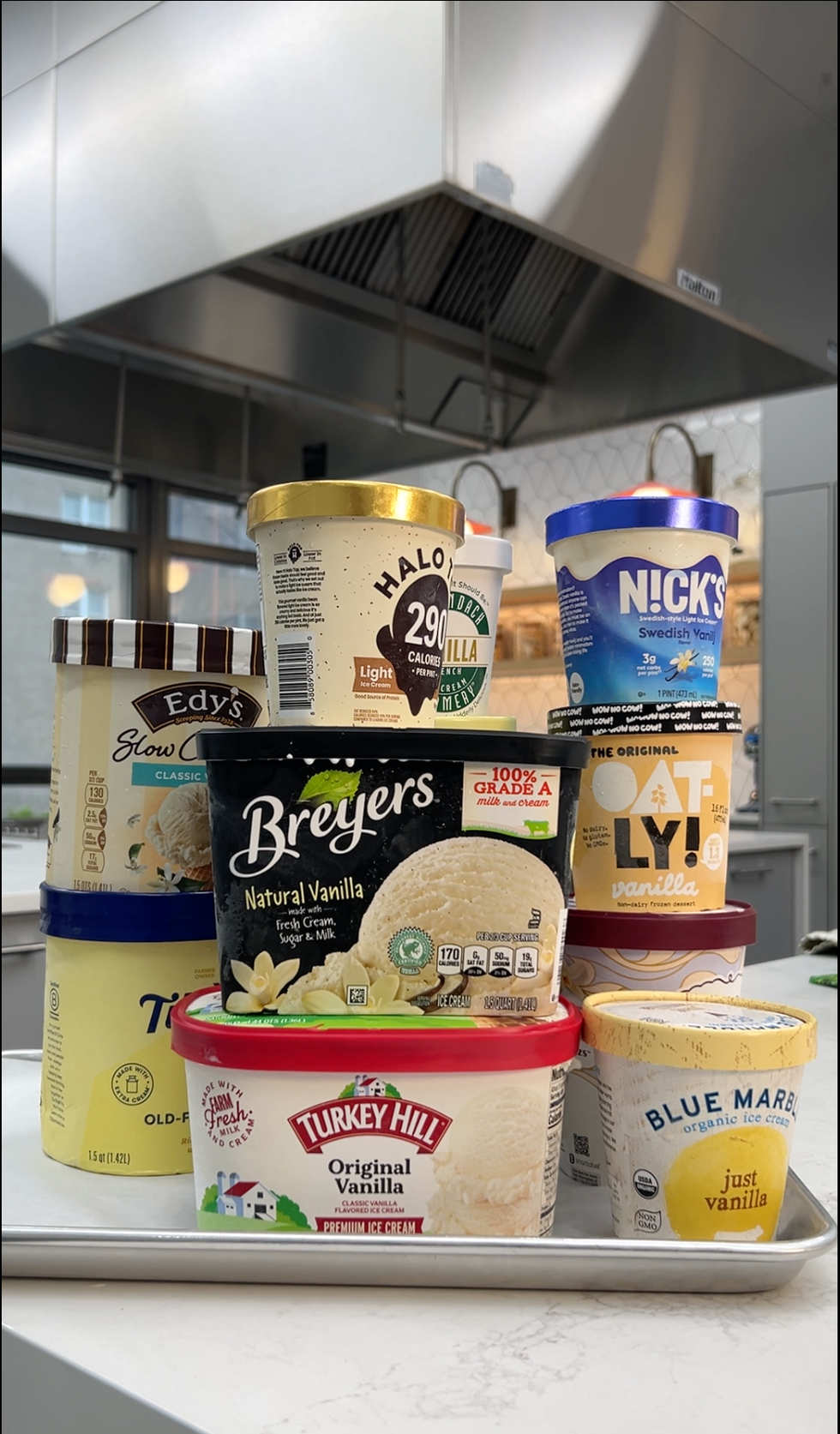 various ice cream containers arranged on a tray