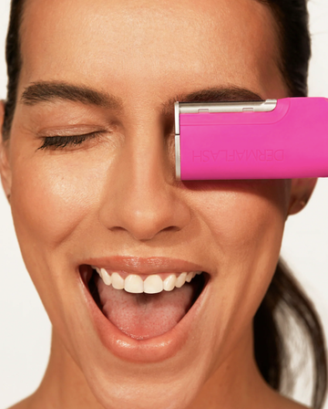 a person holding a bright pink object