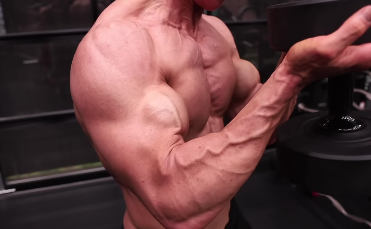 A Strength Coach Explains How to Build Bigger Biceps With Waiter Curls