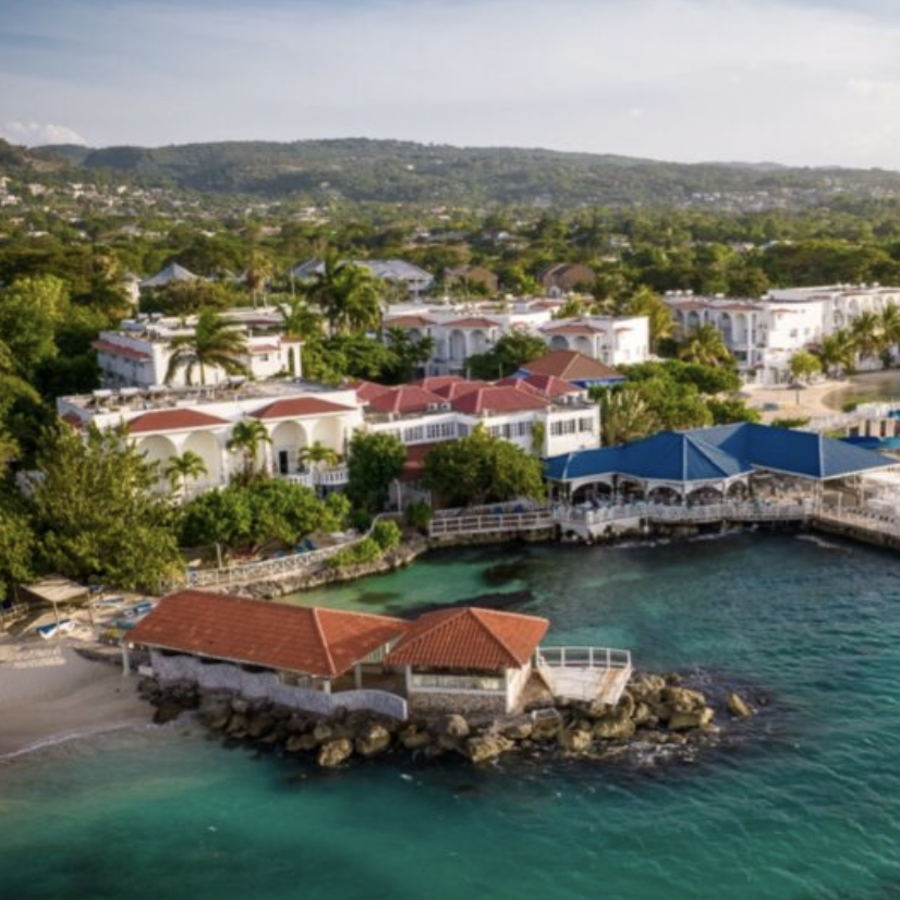 an aerial view of the beach and franklyn d resort and spa, a good housekeeping pick for best all inclusive family resorts