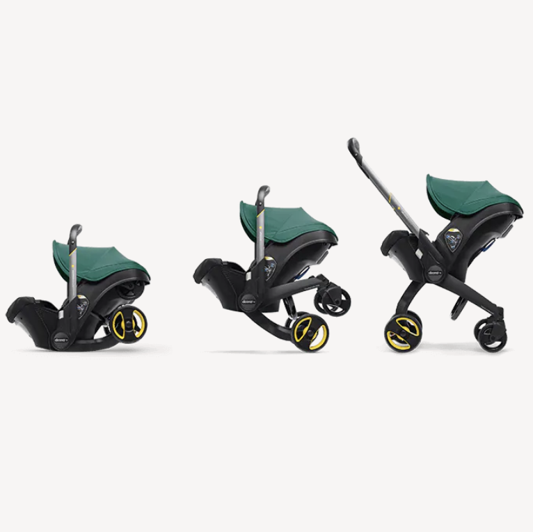 graphic of the doona in car seat mode, transforming mode and stroller mode, green and black doona on a white background, part of a good housekeeping review of the doona stroller