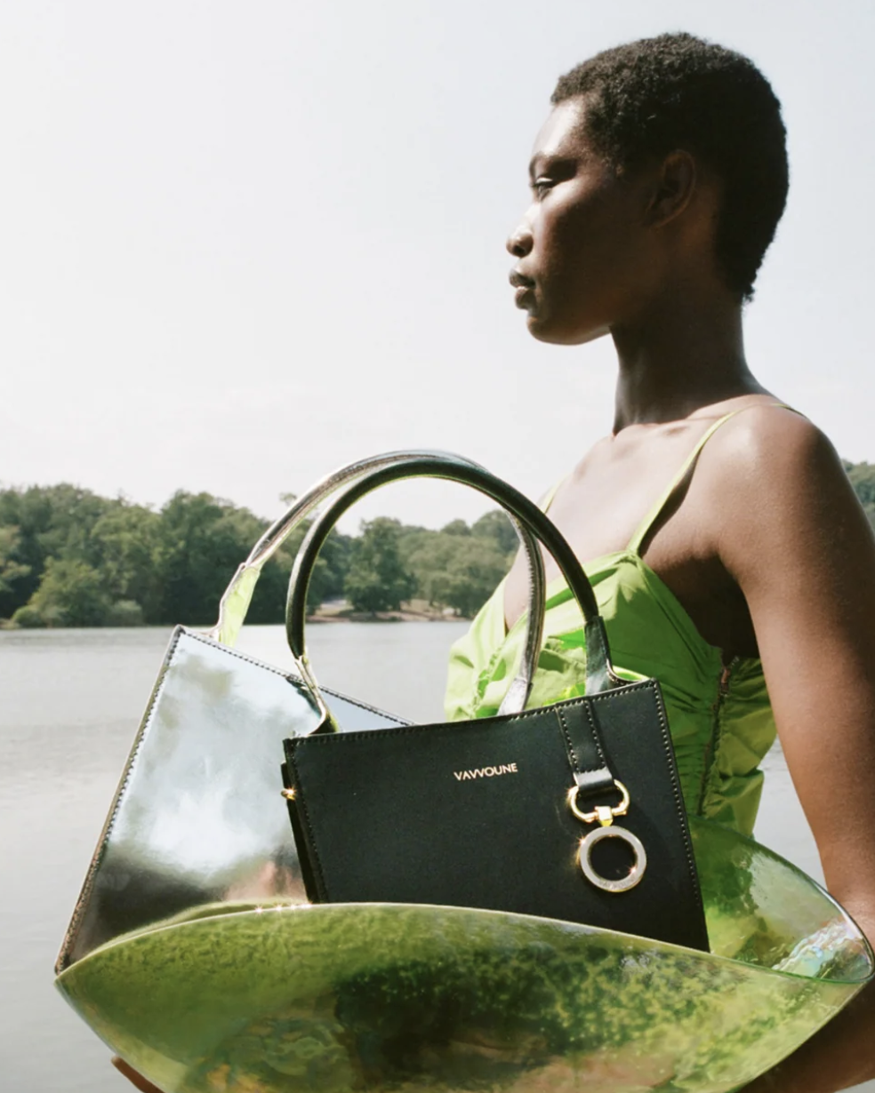black woman with handbag