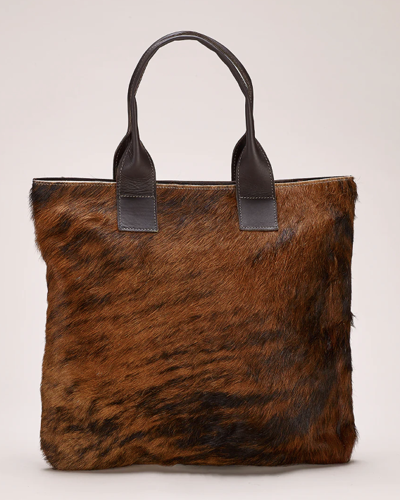 Find the most luxurious hand bags at a trunk show