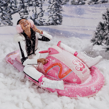 a person riding a snow mobile
