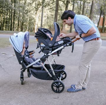 a dad with the mockingbird single to double stroller, part of a good housekeeping review of the mockingbird strollers