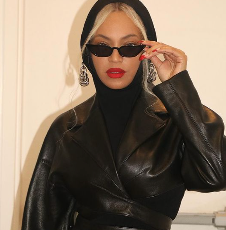 Beyoncé Layers a Cropped Leather Jacket Over a Hooded Tank for a Futuristic Look