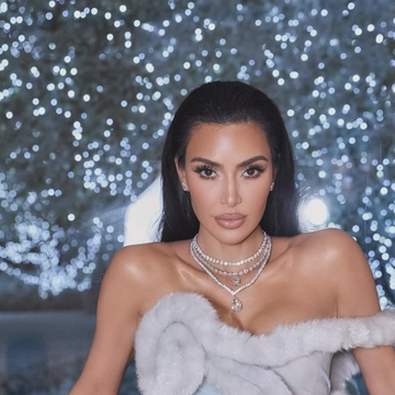 Kim Kardashian slammed for mocking 'normal' people as she eats Cheetos at  gas station in sweatpants for new SKIMS ad
