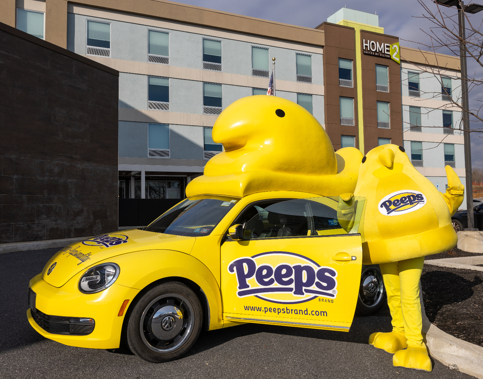 a yellow car with a large yellow hood