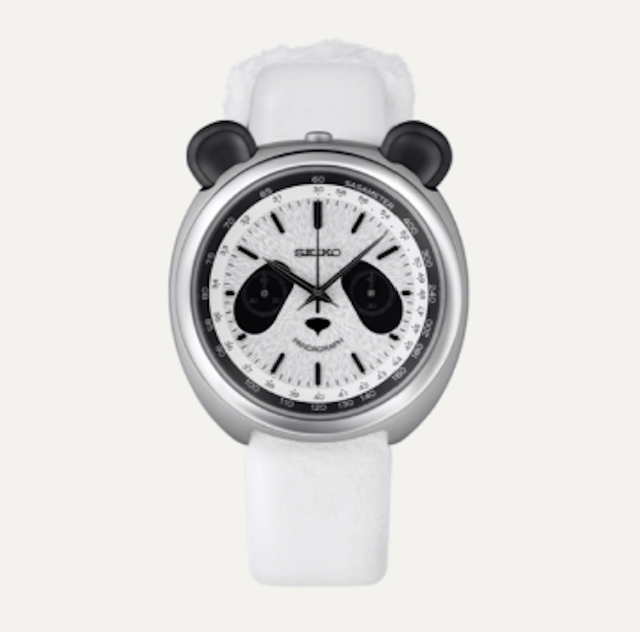 a white watch with a black face