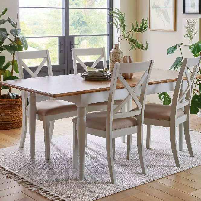 a dining room table with chairs