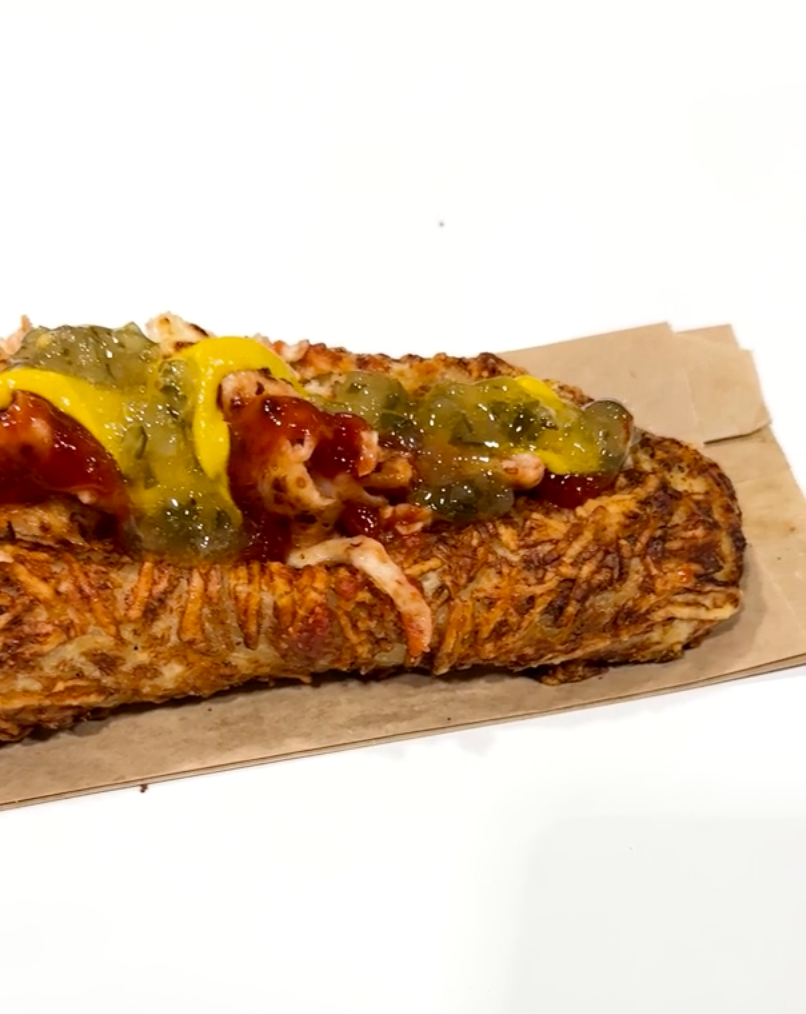 a sandwich with meat and vegetables