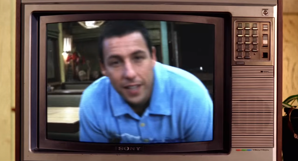 a man in a blue shirt