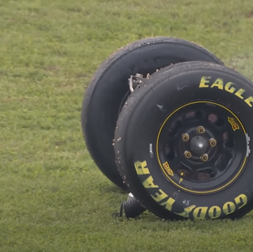 a tire on a grass field