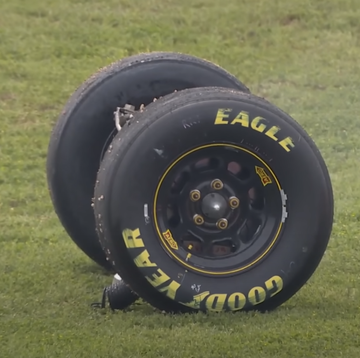 a tire on a grass field