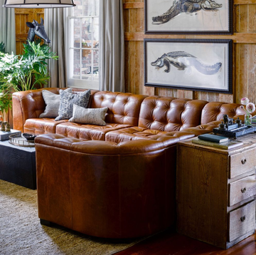 a living room with a couch and coffee table