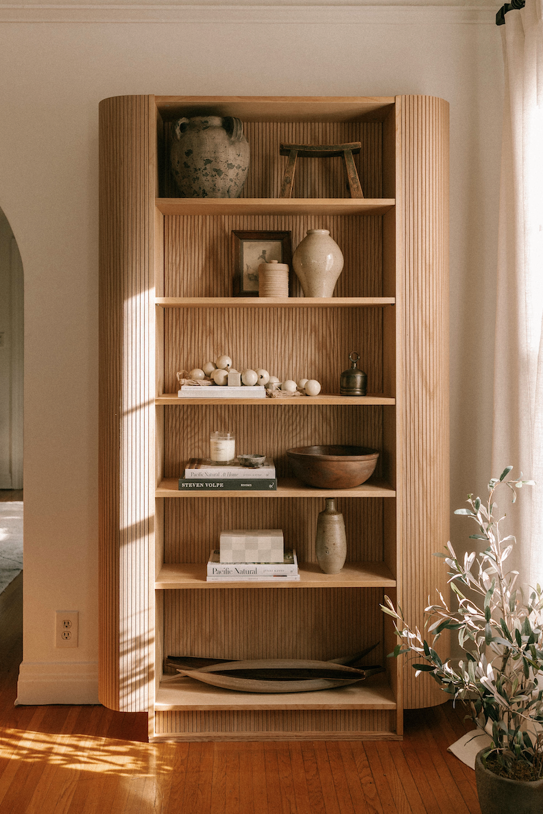 shelf with vases and books