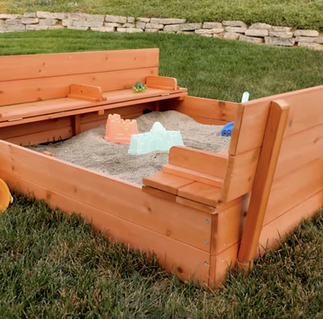 kids sandbox with bench