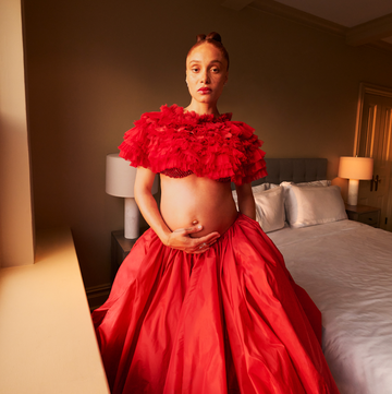 Adwoa Aboah a person in a red dress
