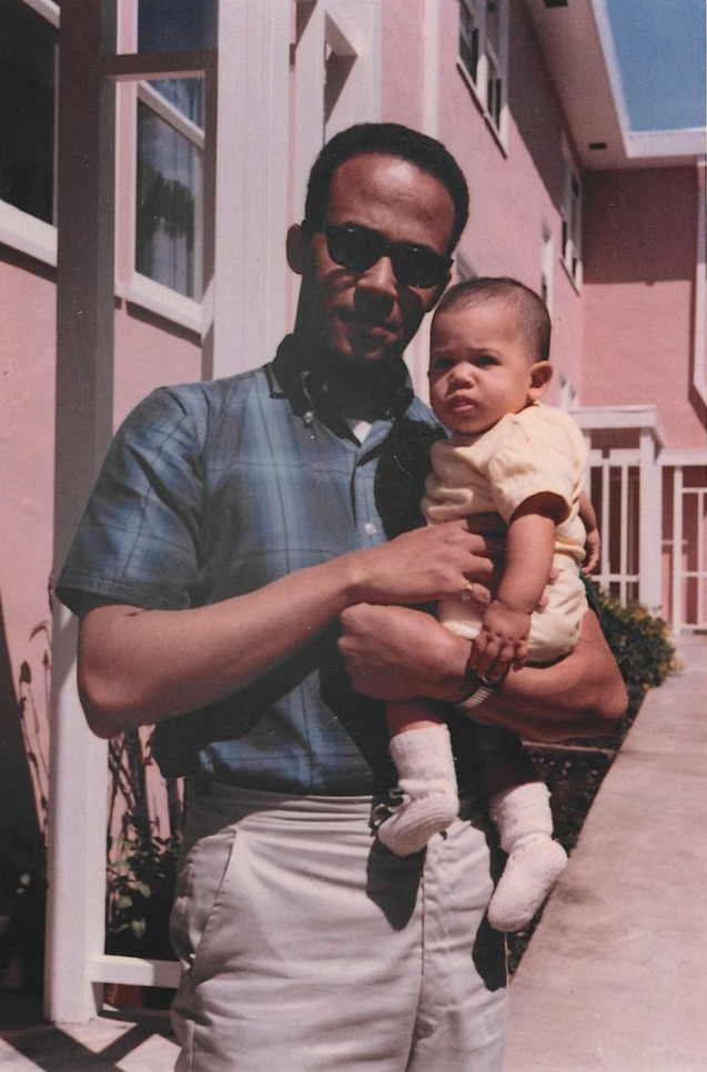 a man holding a baby