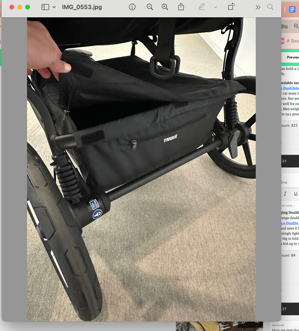 a good housekeeping institute stroller tester unzips the basket under the thule double stroller