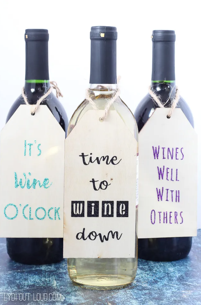 wine bottles with gift tags