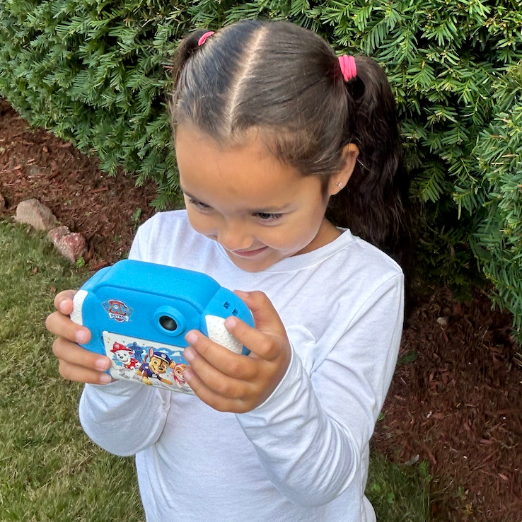 testing the best cameras for kids a young girl holds the canal toys paw patrol camera, a good housekeeping pick for best camera for kids