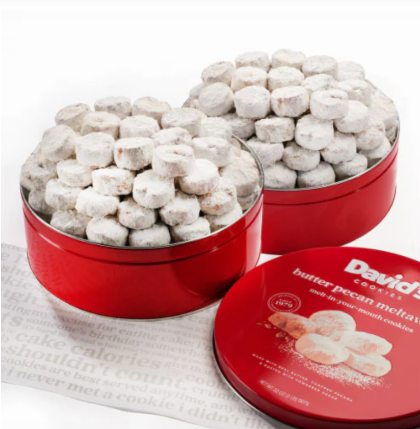 red tins filled with butter pecan meltaway cookies