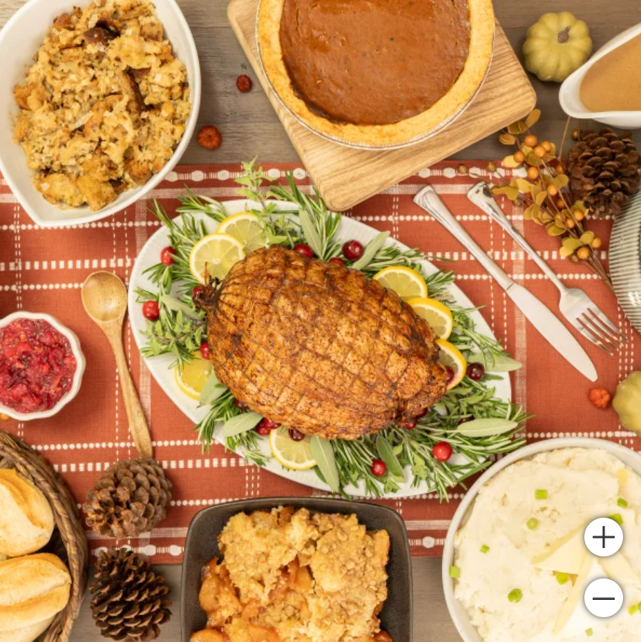 a festive table with a variety of traditional holiday dishes