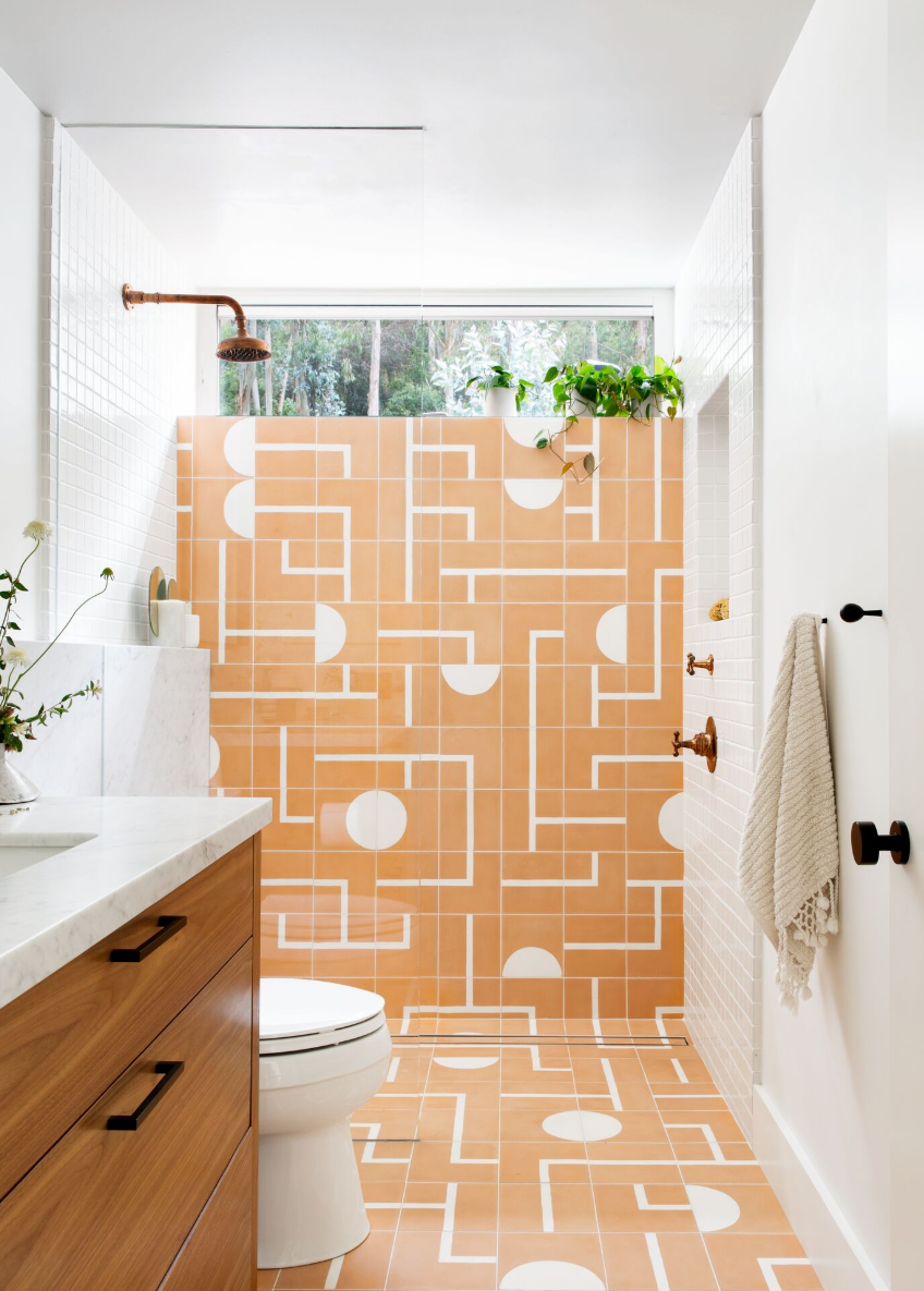 modern bathroom with patterned tile and natural light